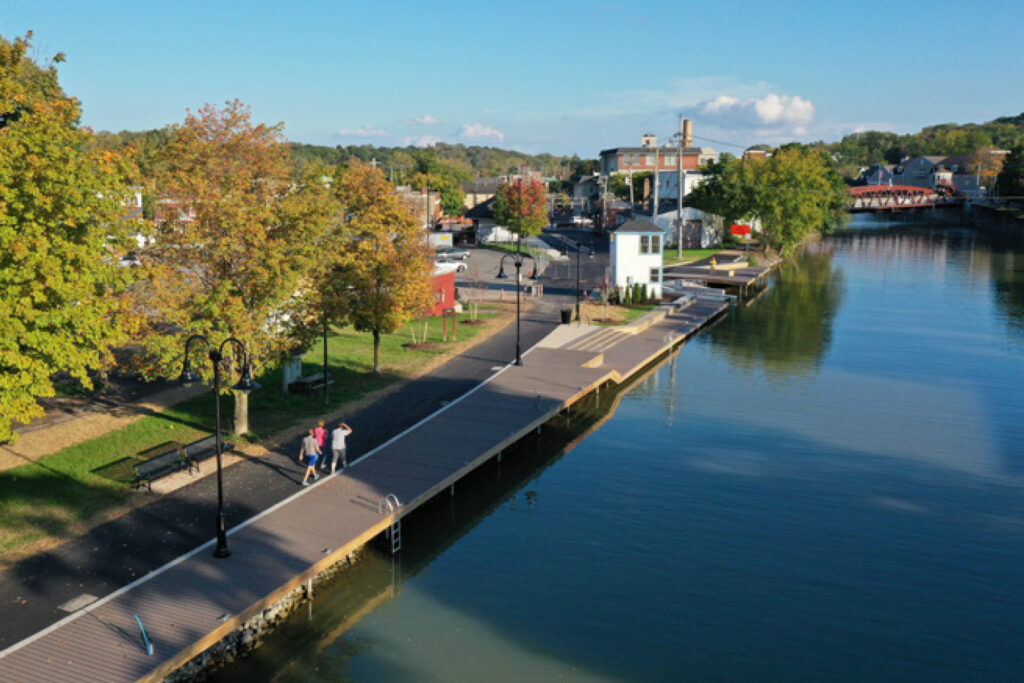 In 2018, the Fairport Industrial Development Agency committed $500,000 to assist with the Fairport Bicentennial Canal Gateway Project which would dramatically transform the banks of the Erie Canal in the heart of the Village. Capitalizing on local assets to create appealing and unique places where people want to live, work and play, the project objectives included improved pedestrian access to the canal, a diversity of recreational opportunities and enhanced connections from the neighborhood to the Main Street corridor. 